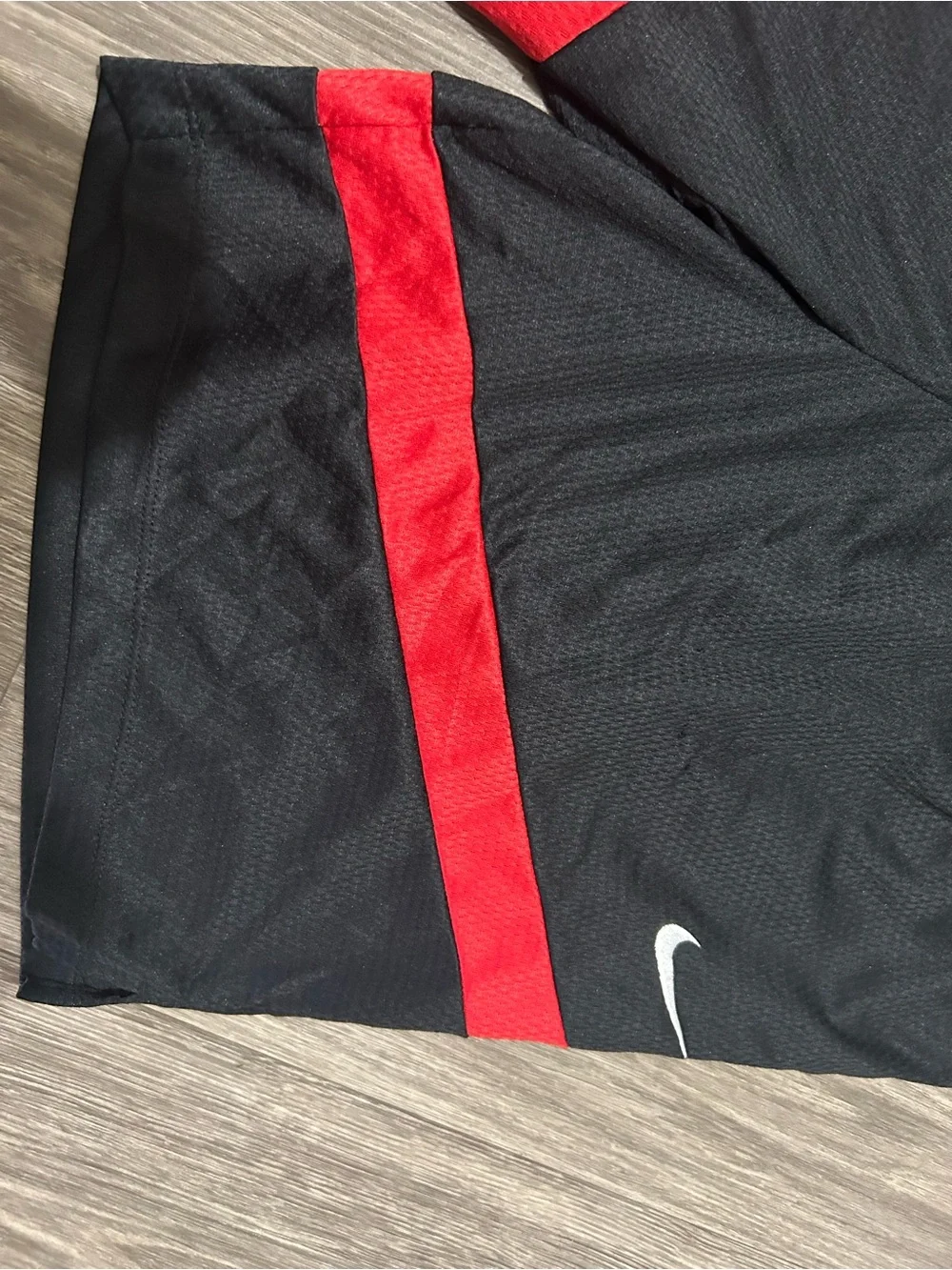 Nike Black Shorts with Red Accent Stripe